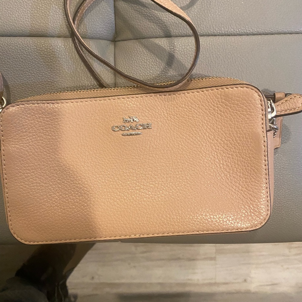 This is a coach cross body clutch, can you make me an offer any OFFER!!!!